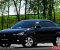 Чорний Міцубісі Lancer, об'ємом двигуна 2 л та пробігом 132 тис. км за 7300 $, фото 3 на Automoto.ua