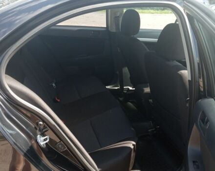 Мицубиси Лансер 2009 в Бобровице на Automoto.ua Черный Мицубиси Лансер, объемом двигателя 1.5 л и пробегом 156 тыс. км за 6700 $, фото 7 на Automoto.ua