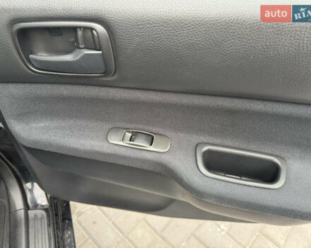 Чорний Міцубісі Lancer, об'ємом двигуна 1.58 л та пробігом 128 тис. км за 5999 $, фото 22 на Automoto.ua