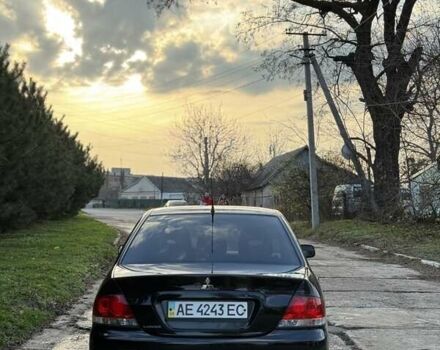 Чорний Міцубісі Lancer, об'ємом двигуна 1.6 л та пробігом 98 тис. км за 5600 $, фото 2 на Automoto.ua