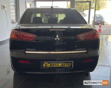 Черный Мицубиси Лансер, объемом двигателя 1.5 л и пробегом 245 тыс. км за 5100 $, фото 5 на Automoto.ua
