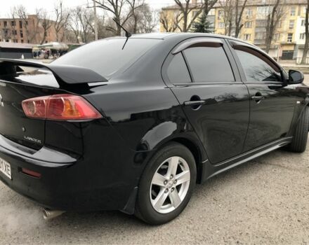 Чорний Міцубісі Lancer, об'ємом двигуна 2 л та пробігом 215 тис. км за 7750 $, фото 14 на Automoto.ua