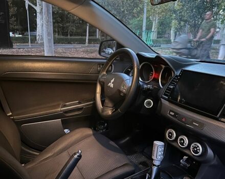 Чорний Міцубісі Lancer, об'ємом двигуна 2 л та пробігом 253 тис. км за 7300 $, фото 13 на Automoto.ua