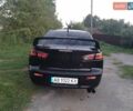 Чорний Міцубісі Lancer, об'ємом двигуна 2 л та пробігом 180 тис. км за 6999 $, фото 7 на Automoto.ua