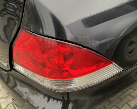 Чорний Міцубісі Lancer, об'ємом двигуна 1.58 л та пробігом 287 тис. км за 4750 $, фото 14 на Automoto.ua