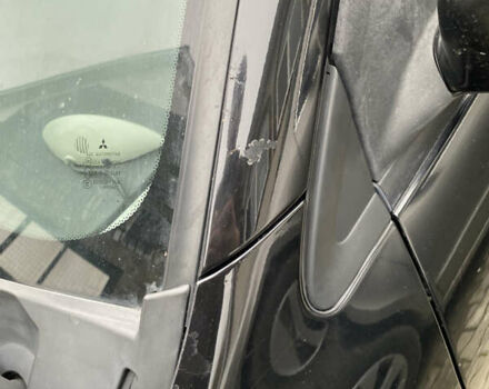 Чорний Міцубісі Lancer, об'ємом двигуна 1.58 л та пробігом 287 тис. км за 4750 $, фото 13 на Automoto.ua