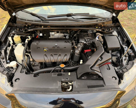 Чорний Міцубісі Lancer, об'ємом двигуна 2 л та пробігом 204 тис. км за 7500 $, фото 9 на Automoto.ua