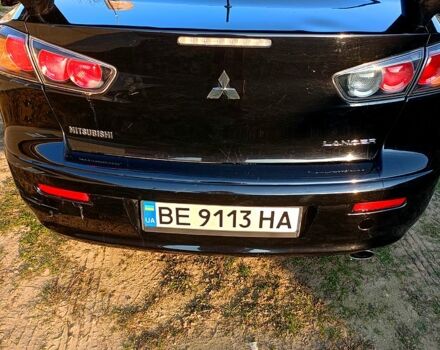 Чорний Міцубісі Lancer, об'ємом двигуна 2 л та пробігом 170 тис. км за 7200 $, фото 1 на Automoto.ua