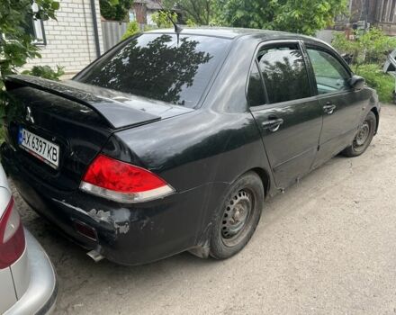 Чорний Міцубісі Lancer, об'ємом двигуна 0 л та пробігом 350 тис. км за 2300 $, фото 2 на Automoto.ua