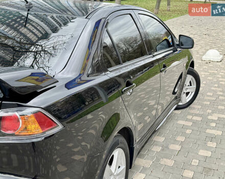 Черный Мицубиси Лансер, объемом двигателя 2 л и пробегом 221 тыс. км за 6750 $, фото 24 на Automoto.ua