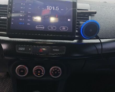 Черный Мицубиси Лансер, объемом двигателя 2 л и пробегом 228 тыс. км за 7000 $, фото 8 на Automoto.ua