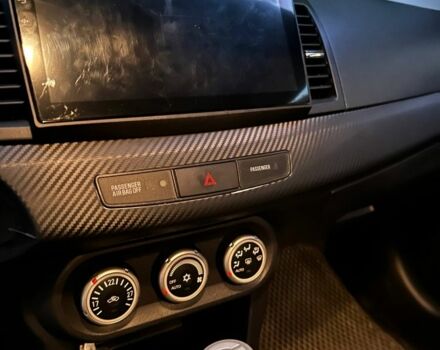 Чорний Міцубісі Lancer, об'ємом двигуна 2 л та пробігом 253 тис. км за 7300 $, фото 11 на Automoto.ua