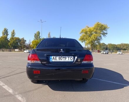Мицубиси Лансер 2009 в Днепре (Днепропетровске) на Automoto.ua Черный Мицубиси Лансер, объемом двигателя 1.6 л и пробегом 220 тыс. км за 4700 $, фото 4 на Automoto.ua