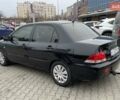 Чорний Міцубісі Lancer, об'ємом двигуна 1.6 л та пробігом 186 тис. км за 5500 $, фото 2 на Automoto.ua