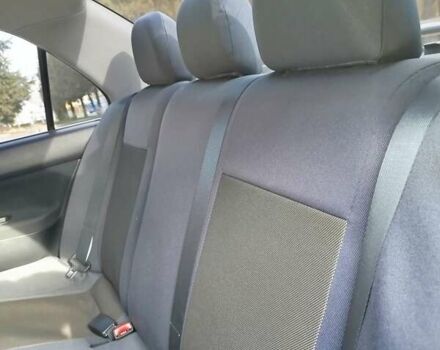 Черный Мицубиси Лансер, объемом двигателя 1.58 л и пробегом 78 тыс. км за 6500 $, фото 8 на Automoto.ua