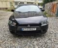 Чорний Міцубісі Lancer, об'ємом двигуна 2 л та пробігом 214 тис. км за 5900 $, фото 7 на Automoto.ua