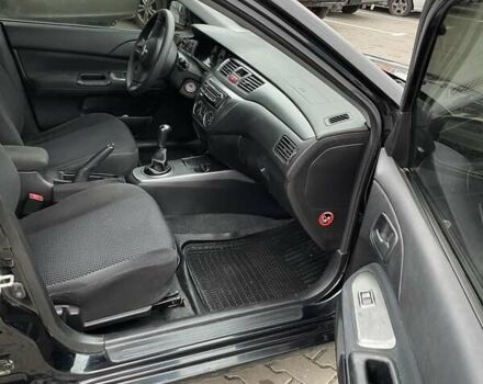 Чорний Міцубісі Lancer, об'ємом двигуна 1.6 л та пробігом 186 тис. км за 5500 $, фото 10 на Automoto.ua