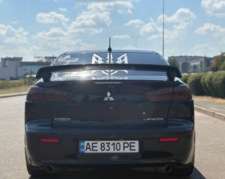 Черный Мицубиси Лансер, объемом двигателя 2 л и пробегом 216 тыс. км за 6950 $, фото 4 на Automoto.ua