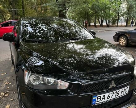 Чорний Міцубісі Lancer, об'ємом двигуна 2 л та пробігом 253 тис. км за 7300 $, фото 1 на Automoto.ua