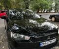 Чорний Міцубісі Lancer, об'ємом двигуна 2 л та пробігом 253 тис. км за 7300 $, фото 1 на Automoto.ua