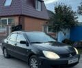Чорний Міцубісі Lancer, об'ємом двигуна 1.62 л та пробігом 250 тис. км за 2250 $, фото 1 на Automoto.ua