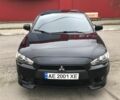 Чорний Міцубісі Lancer, об'ємом двигуна 2 л та пробігом 215 тис. км за 7750 $, фото 1 на Automoto.ua