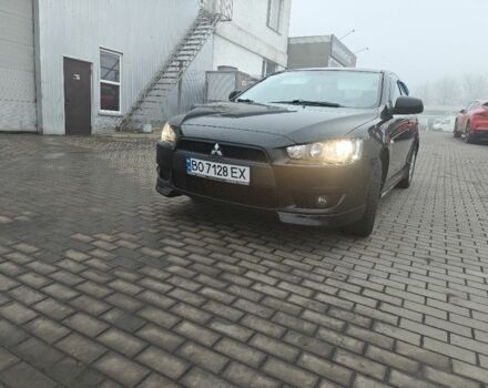 Черный Мицубиси Лансер, объемом двигателя 2 л и пробегом 228 тыс. км за 7000 $, фото 1 на Automoto.ua