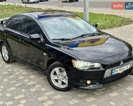 Черный Мицубиси Лансер, объемом двигателя 2 л и пробегом 221 тыс. км за 6750 $, фото 10 на Automoto.ua