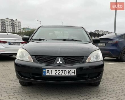 Чорний Міцубісі Lancer, об'ємом двигуна 1.6 л та пробігом 186 тис. км за 5500 $, фото 7 на Automoto.ua
