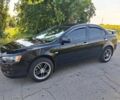 Чорний Міцубісі Lancer, об'ємом двигуна 1.5 л та пробігом 86 тис. км за 8700 $, фото 1 на Automoto.ua