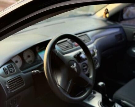 Чорний Міцубісі Lancer, об'ємом двигуна 1.6 л та пробігом 98 тис. км за 5600 $, фото 7 на Automoto.ua