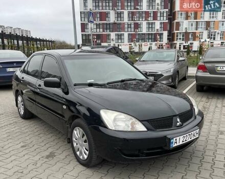 Чорний Міцубісі Lancer, об'ємом двигуна 1.6 л та пробігом 186 тис. км за 5500 $, фото 6 на Automoto.ua
