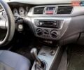 Черный Мицубиси Лансер, объемом двигателя 1.58 л и пробегом 78 тыс. км за 6500 $, фото 24 на Automoto.ua