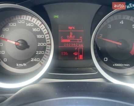 Черный Мицубиси Лансер, объемом двигателя 2 л и пробегом 201 тыс. км за 7000 $, фото 9 на Automoto.ua
