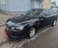 Чорний Міцубісі Lancer, об'ємом двигуна 2 л та пробігом 249 тис. км за 7500 $, фото 1 на Automoto.ua