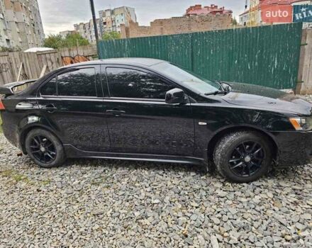 Чорний Міцубісі Lancer, об'ємом двигуна 2 л та пробігом 214 тис. км за 5900 $, фото 4 на Automoto.ua