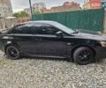 Чорний Міцубісі Lancer, об'ємом двигуна 2 л та пробігом 214 тис. км за 5900 $, фото 4 на Automoto.ua