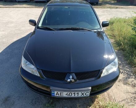 Чорний Міцубісі Lancer, об'ємом двигуна 1.6 л та пробігом 215 тис. км за 5200 $, фото 6 на Automoto.ua