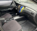 Чорний Міцубісі Lancer, об'ємом двигуна 1.58 л та пробігом 287 тис. км за 4750 $, фото 3 на Automoto.ua