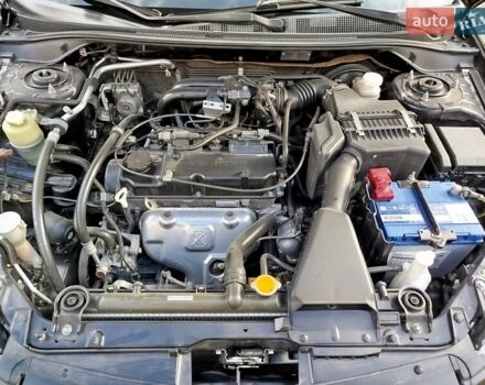 Черный Мицубиси Лансер, объемом двигателя 1.58 л и пробегом 78 тыс. км за 6500 $, фото 14 на Automoto.ua