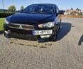 Черный Мицубиси Лансер, объемом двигателя 2 л и пробегом 184 тыс. км за 6999 $, фото 1 на Automoto.ua