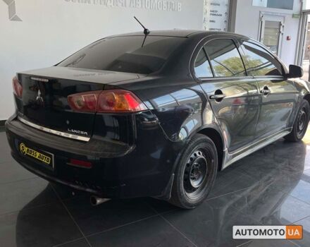 Черный Мицубиси Лансер, объемом двигателя 1.5 л и пробегом 245 тыс. км за 5100 $, фото 6 на Automoto.ua