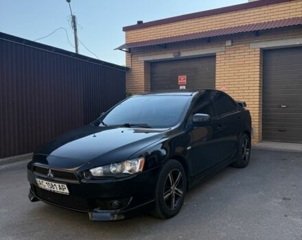 Чорний Міцубісі Lancer, об'ємом двигуна 2 л та пробігом 209 тис. км за 7600 $, фото 2 на Automoto.ua