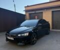 Чорний Міцубісі Lancer, об'ємом двигуна 2 л та пробігом 209 тис. км за 7600 $, фото 2 на Automoto.ua