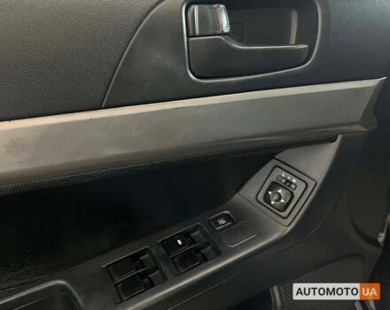 Черный Мицубиси Лансер, объемом двигателя 1.5 л и пробегом 245 тыс. км за 5100 $, фото 11 на Automoto.ua