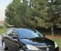 Чорний Міцубісі Lancer, об'ємом двигуна 1.6 л та пробігом 98 тис. км за 5600 $, фото 10 на Automoto.ua