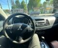 Чорний Міцубісі Lancer, об'ємом двигуна 2 л та пробігом 243 тис. км за 7400 $, фото 6 на Automoto.ua