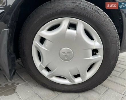 Чорний Міцубісі Lancer, об'ємом двигуна 1.58 л та пробігом 128 тис. км за 5999 $, фото 27 на Automoto.ua