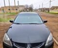 Чорний Міцубісі Lancer, об'ємом двигуна 1.6 л та пробігом 300 тис. км за 3500 $, фото 4 на Automoto.ua