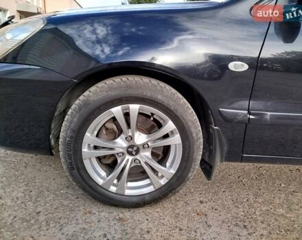 Черный Мицубиси Лансер, объемом двигателя 1.58 л и пробегом 78 тыс. км за 6500 $, фото 5 на Automoto.ua